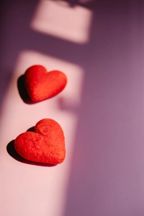 Hearts on table as background